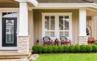 double pane windows on a tan and white house