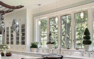 four single pane windows in the kitchen