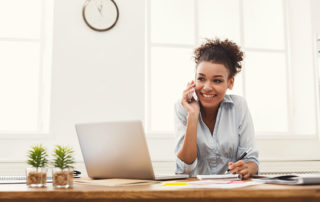 A woman on the phone in an office