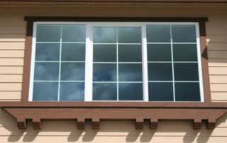 a window on the side of a house