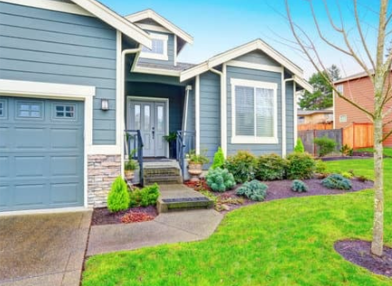 Beautiful Replacement Windows In House With Blue Siding