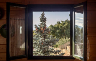 Black Framed Window Open In Home